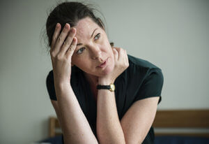 a woman thinks about her mood disorder treatment program
