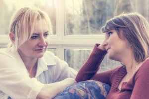 Two women considering an inpatient alcohol rehab center